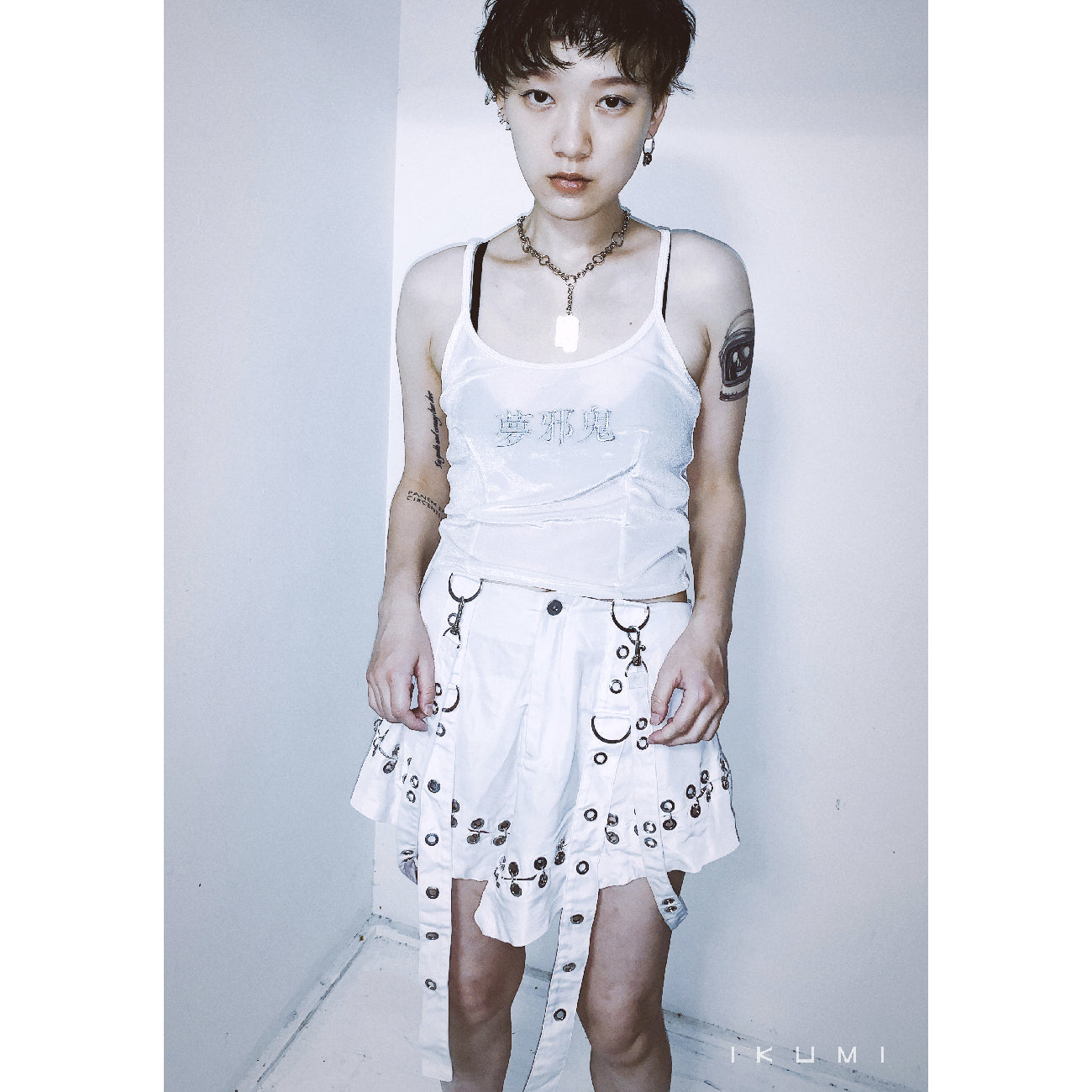 PIERCED MINI SKIRT