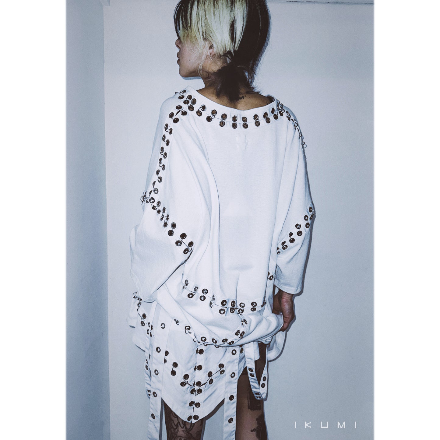 PIERCED MINI SKIRT