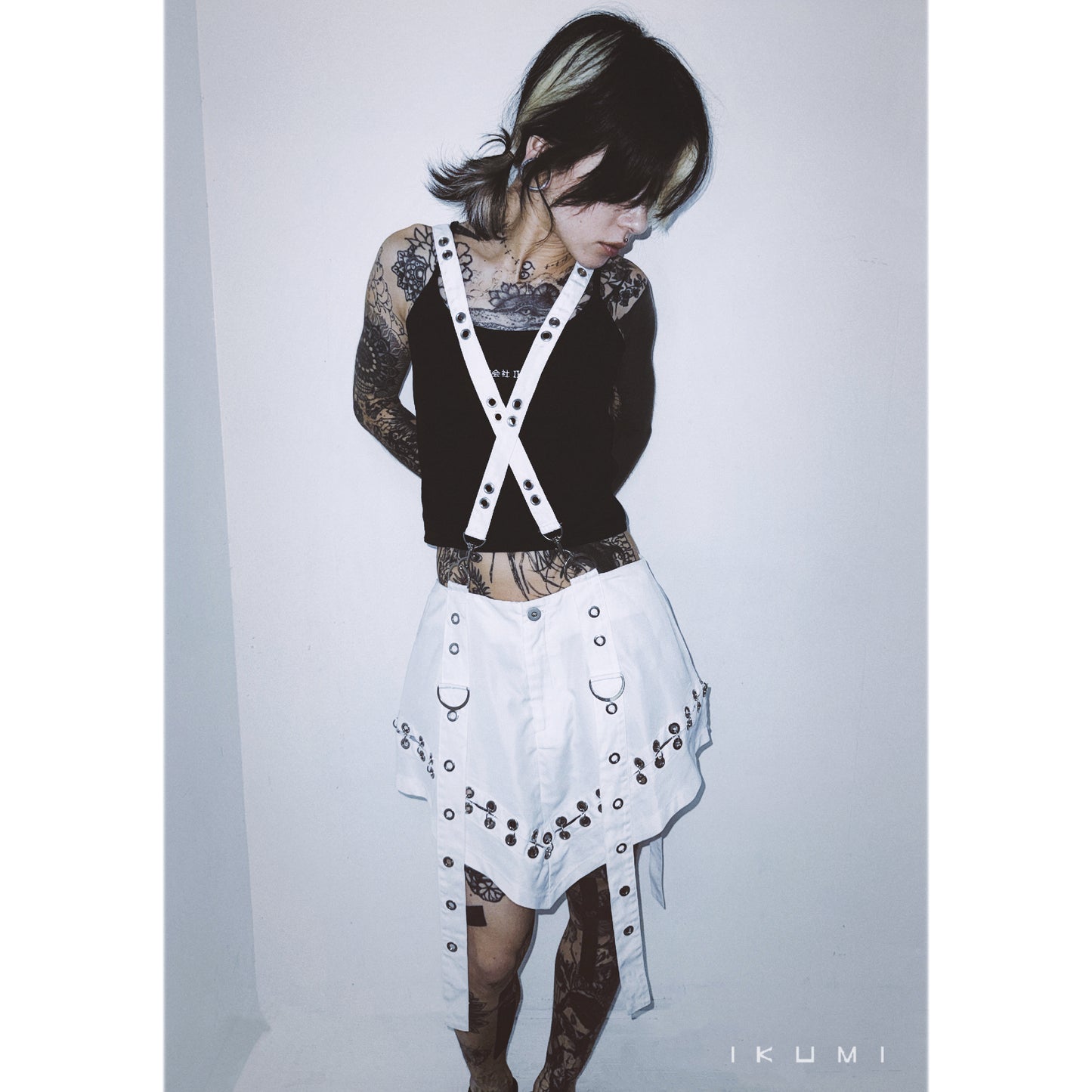 PIERCED MINI SKIRT